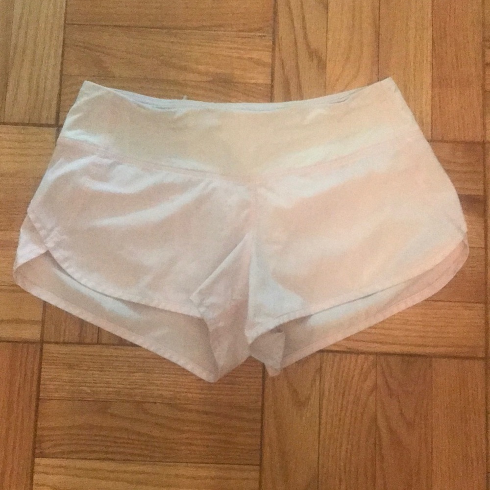 Light pink LuLu Lemon running shorts, size 4.